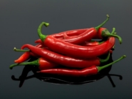 Picture of Chillis on black Splashback