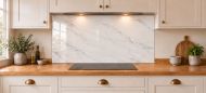 Pearl Grey Marble Effect Glass Splashback as a wide panel under the cooker hood in a white shaker kitchen