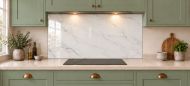 Pearl Grey Marble Effect Glass Splashback as a wide panel under the cooker hood in a sage shaker kitchen