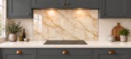 Champagne Gold Marble Effect Glass Splashback as a wide panel under the cooker hood in a charcoal shaker kitchen