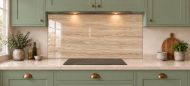 Warm Beige Travertine Effect Glass Splashback as a wide panel under the cooker hood in a sage shaker kitchen
