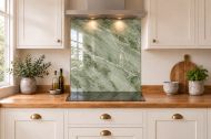 Sage Green Marble Effect Glass Splashback as a hob-width panel in a white shaker kitchen