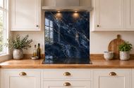 Navy & Gold Marble Effect Glass Splashback as a hob-width panel in a white shaker kitchen