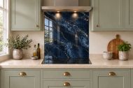Navy & Gold Marble Effect Glass Splashback as a hob-width panel in a sage shaker kitchen