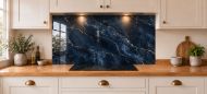 Navy & Gold Marble Effect Glass Splashback as a wide panel under the cooker hood in a white shaker kitchen