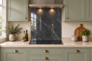 Charcoal & Silver Marble Effect Glass Splashback as a hob-width panel in a sage shaker kitchen