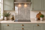 Warm Grey Concrete Effect Glass Splashback as a hob-width panel in a sage shaker kitchen