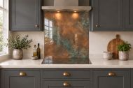 Soft Copper Patina Effect Glass Splashback as a hob-width panel in a charcoal shaker kitchen